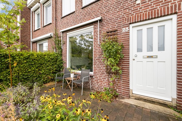 Foto - Te koop: Sfeervolle tussenwoning met groene oase!